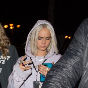 Cara Delevingne et Lily Donaldson arrivent à "L'Arc" pour la soirée Fenty Puma By Rihanna. Paris, le 6 mars 2017.