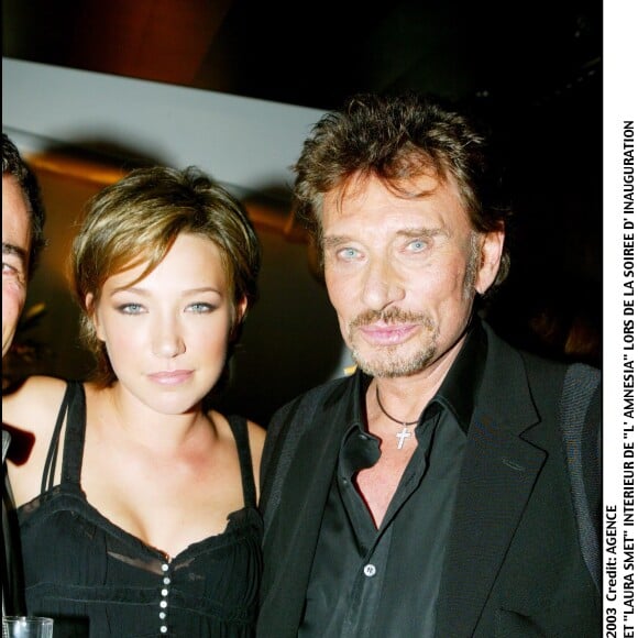 Johnny Hallyday et Laura Smet lors de la soirée d'inauguration de l'Amnésia, le 1er octobre 2003.