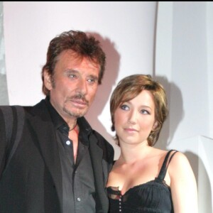 Johnny Hallyday et Laura Smet lors de la soirée d'inauguration de l'Amnésia, le 1er octobre 2003.