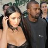 Kim Kardashian et Kanye West arrivent chez Givenchy, à Paris, le 29 septembre 2016.