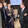 La princesse Lalla Meryem du Maroc, soeur du roi Mohammed VI, et le président François Hollande à l'inauguration du salon du livre "Livre Paris" à la Porte de Versailles le 23 mars 2017. Le Maroc est le pays invité d'honneur de cette 37e édition de la manifestation littéraire.