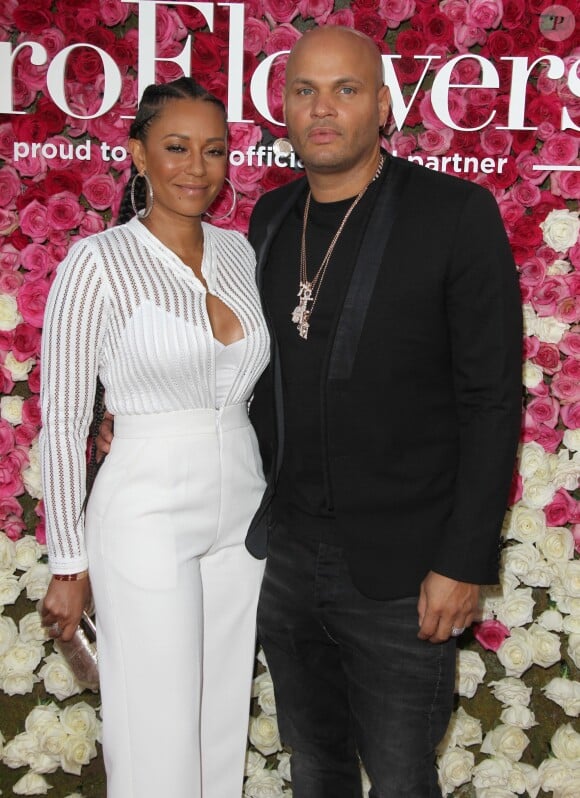 Mel B (Melanie Brown) et son mari Stephen Belafonte à la première de Mother's Day (Fête des mères) au théâtre The TCL Chinese à Hollywood, le 13 avril 2016