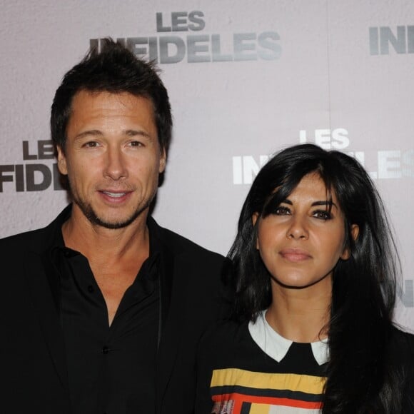 Archive - Stephane Rousseau et sa compagne Reem Kherici lors de l'avant-premiere des Infideles a Paris le 14 fevrier 2012