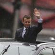 Emmanuel Macron (costume "Jonas &amp; Cie" (rue d'Aboukir à Paris) à 450 Euros) salue les français sur l'avenue des Champs Elysées à Paris le 14 Mai 2017.