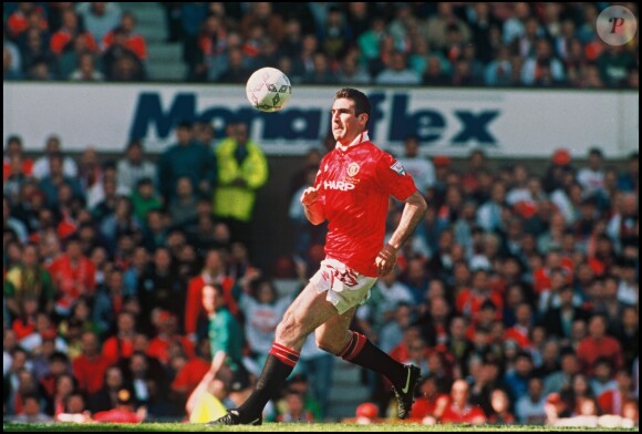 Eric Cantona sous le maillot de Manchester United en 1994 lors de la Ligue des Champions.