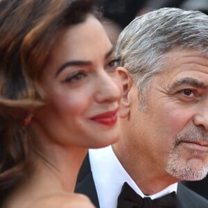 George Clooney et sa femme Amal Alamuddin Clooney (bijoux Cartier) - Montée des marches du film "Money Monster" lors du 69e Festival International du Film de Cannes. Le 12 mai 2016. © Giancarlo Gorassini/Bestimage