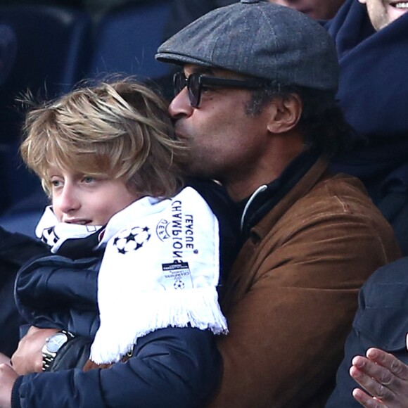 Yannick Noah et son fils Joalukas - People au match de de la ligue 1 entre le PSG et Evian au Parc des Princes à Paris le 18 janvier 2015.