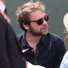 Cyril Mokaiesh et sa compagne Elodie Frégé dans les tribunes des Internationaux de Tennis de Roland Garros à Paris le 7 juin 2017 © Cyril Moreau-Dominique Jacovides/Bestimage