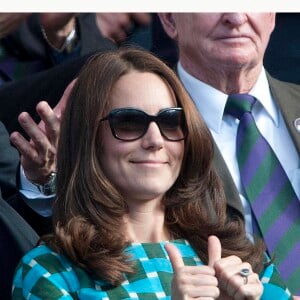 Kate Middleton, duchesse de Cambridge, lors de la finale hommes du tournoi de tennis de Wimbledon à Londres, le 6 juillet 2014.