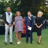 Exclusif - Tony Yoka et sa compagne Estelle Mossely (enceinte, habillée par Christophe Guillarmé) , Stéphane Bern et Pamela Anderson - Grand concert de l'Orchestre National de France au Champs de Mars présenté par S. Bern sur France 2 pour célébrer la Fête Nationale à Paris le 14 juillet 2017 © Giancarlo Gorassini / Pierre Perusseau / Veeren / Bestimage