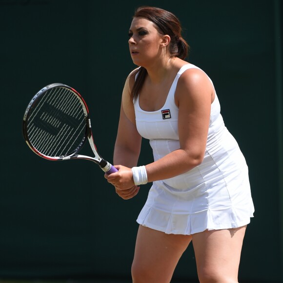 Marion Bartoli participe au tournoi des légendes de Wimbledon, Londres, le 12 juillet 2017.