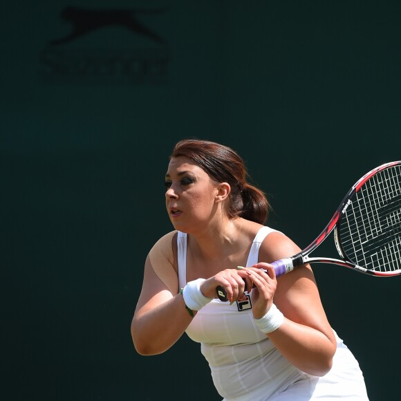 Marion Bartoli participe au tournoi des légendes de Wimbledon, Londres, le 12 juillet 2017.