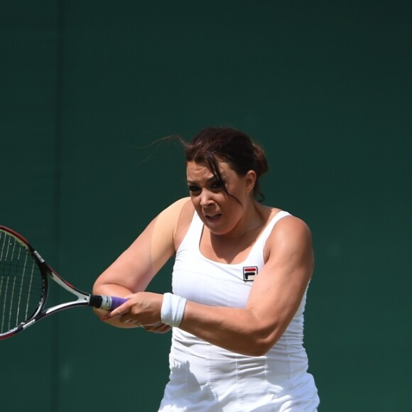 Marion Bartoli participe au tournoi des légendes de Wimbledon, Londres, le 12 juillet 2017.