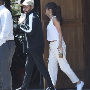 The Weeknd (Abel Tesfaye) et Selena Gomez sortant d'un restaurant après avoir déjeuner, à Los Angeles le 23 juillet 2017