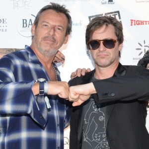 Jean-Luc Reichmann et Thomas Dutronc lors de la 5ème édition de la Fight Night à la Citadelle de Saint-Tropez, le 4 août 2017.La Fight Night est un concept original alliant les plus hautes valeurs des sports de combats internationaux au glamour de Saint-­Tropez. Certains des plus grands noms de la boxe thaï et du kick-boxing mondiaux se sont affrontés sur ce ring faisant désormais partie de la légende de la boxe sous toutes ses formes. Cette prestigieuse soirée de gala est devenue au cours du temps LA marque d'un succès sportif et people retentissant. Un événement incontournable dans le village le plus célèbre de la Côte d'Azur. © Rachid Bellak/Bestimage04/08/2017 -