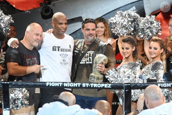 Olivier Muller ( homme d'affaires suisse organisateur de la soirée), Gregory Tony (vainqueur) et guest lors de la 5ème édition de la Fight Night à la Citadelle de Saint-Tropez, le 4 août 2017.La Fight Night est un concept original alliant les plus hautes valeurs des sports de combats internationaux au glamour de Saint-­Tropez. Certains des plus grands noms de la boxe thaï et du kick-boxing mondiaux se sont affrontés sur ce ring faisant désormais partie de la légende de la boxe sous toutes ses formes. Cette prestigieuse soirée de gala est devenue au cours du temps LA marque d'un succès sportif et people retentissant. Un événement incontournable dans le village le plus célèbre de la Côte d'Azur. © Rachid Bellak/Bestimage04/08/2017 -