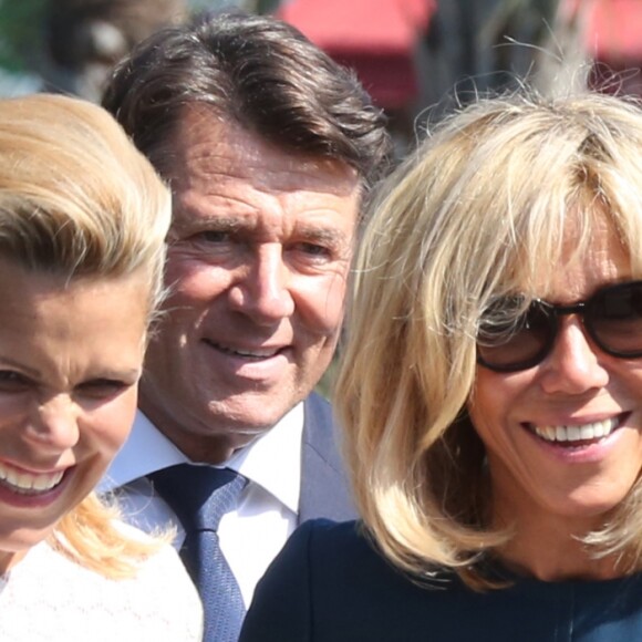 Laura Tenoudji (enceinte), son mari Christian Estrosi, maire de Nice, Brigitte Macron (Trogneux), Pierre-Olivier Costa lors de la cérémonie d'hommage aux victimes de l'attentat du 14 juillet 2016 à Nice, le 14 juillet 2017. © Bahi/Bestimage