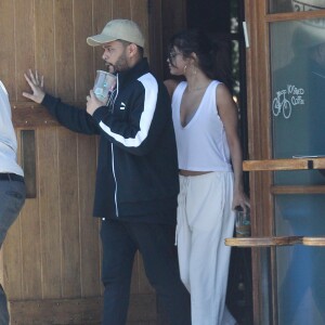 Selena Gomez et son compagnon The Weeknd (Abel Tesfaye) sont allés déjeuner dans un restaurant à Los Angeles, le 23 juillet 2017 © CPA/Bestimage