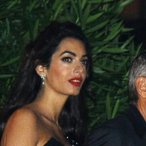 Amal et George Clooney se promènent dans un bateau taxi lors du 74ème Festival International du Film de Venise en Italie le 31 aout 2017