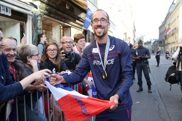 Yohann Diniz médaille d'or du 50 Km marche - L'équipe de France d'athlétisme a été reçue à l'Elysée par François Hollande et Najat Vallaud-Belkacem, le 18 août 2014.