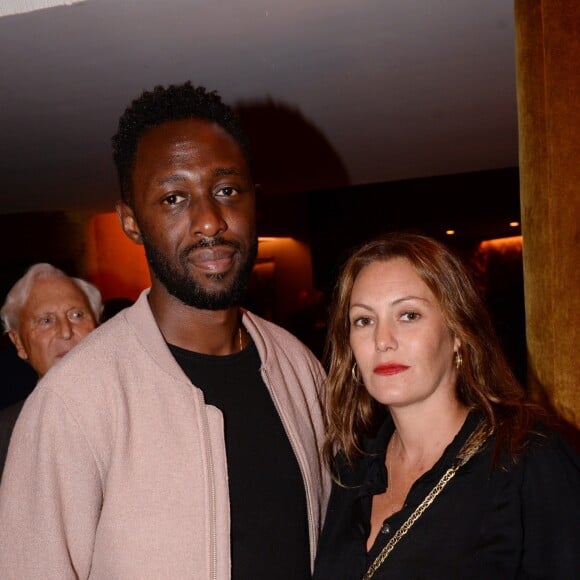 Thomas N'Gijol et sa compagne Karole Rocher enceinte de son 4ème enfant - Soirée d'inauguration de l'Hôtel Fouquet's Barrière à Paris le 14 septembre 2017. © Rachid Bellak/Bestimage