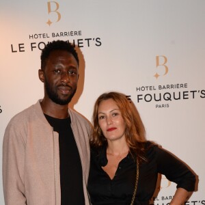 Thomas N'Gijol et sa compagne Karole Rocher enceinte de son 4ème enfant - Soirée d'inauguration de l'Hôtel Fouquet's Barrière à Paris le 14 septembre 2017. © Rachid Bellak/Bestimage