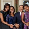 Michelle, Barack Obama et leurs filles Malia et Sasha à Washington. Décembre 2011.