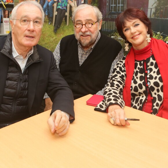 Exclusif - Bernard Le Coq, Joël Santoni, Anny Duperey - Séance de dédicaces à l'occasion du livre commémorant les 25 ans de la série "Une famille formidable" à la librairie Gibert Joseph à Paris, le 09 décembre 2017 © CVS/Bestimage