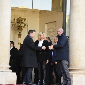 Xavier Bettel et Brigitte Macron (Trogneux) - Le président Emmanuel Macron quitte le palais de l'Elysée avec les chefs d'état du One Planet Summit pour rejoindre un bateau au Pont Alexandre III à Paris le 12 décembre 2017. © Pierre Perusseau / Bestimage