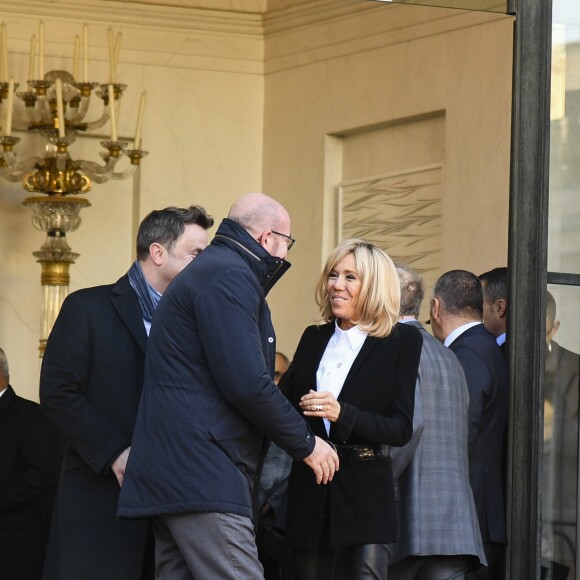 Charles Michel, Brigitte Macron (Trogneux), Xavier Bettel - Le président Emmanuel Macron quitte le palais de l'Elysée avec les chefs d'état du One Planet Summit pour rejoindre un bateau au Pont Alexandre III à Paris le 12 décembre 2017. © Pierre Perusseau / Bestimage