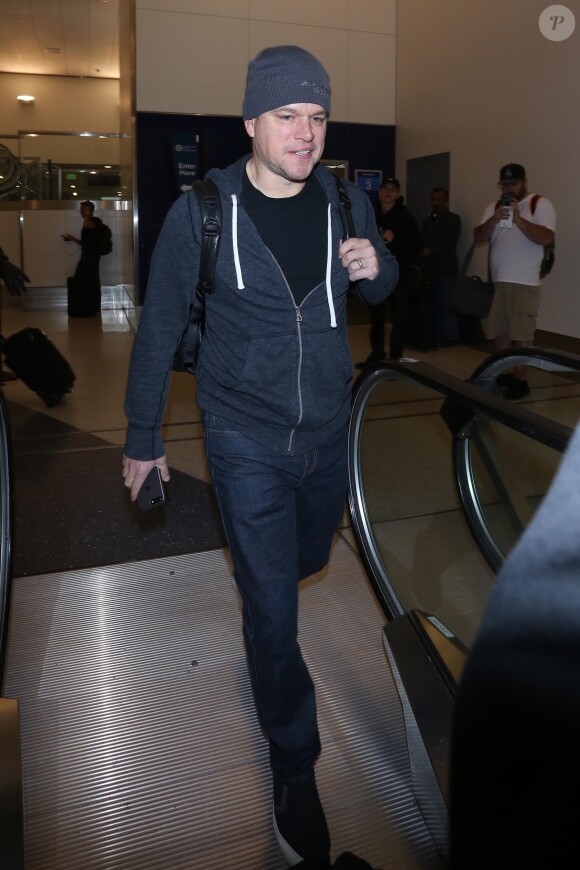 Matt Damon arrive à l'aéroport de LAX à Los Angeles, le 5 décembre 2017