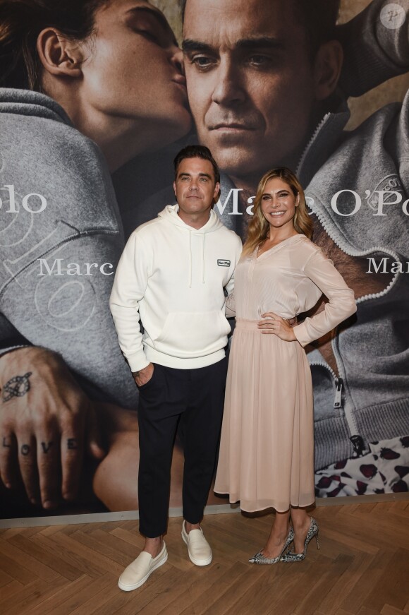 Robbie Williams et sa femme Ayda Field présentent la collection "Robbie Williams x Marc O'Polo" lancée à l'occasion du 50ème anniversaire de la marque. La collection se compose d'une vingtaine de pièces sportswear pour hommes et femmes signées Robbie et Ayda. Munich, le 6 juillet 2017.