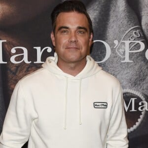 Robbie Williams et sa femme Ayda Field présentent la collection "Robbie Williams x Marc O'Polo" lancée à l'occasion du 50ème anniversaire de la marque. La collection se compose d'une vingtaine de pièces sportswear pour hommes et femmes signées Robbie et Ayda. Munich, le 6 juillet 2017.