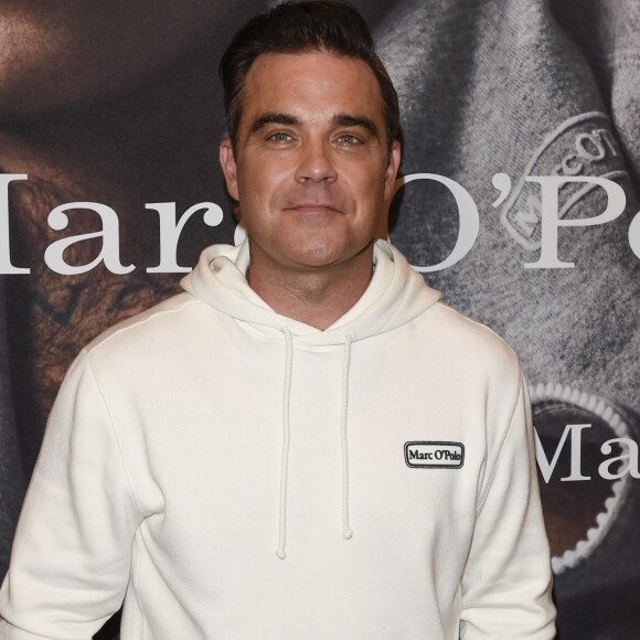 Robbie Williams et sa femme Ayda Field présentent la collection "Robbie Williams x Marc O'Polo" lancée à l'occasion du 50ème anniversaire de la marque. La collection se compose d'une vingtaine de pièces sportswear pour hommes et femmes signées Robbie et Ayda. Munich, le 6 juillet 2017.