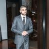 Zayn Malik quitte l'appartement de sa petite amie G. Hadid à New York. Le chanteur porte un costume gris, le 12 septembre 2017.