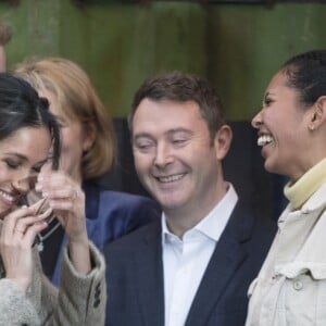 Le prince Harry et Meghan Markle arrivent à la station de radio Reprezent dans le quartier de Brixton à Londres le 9 janvier 2018.