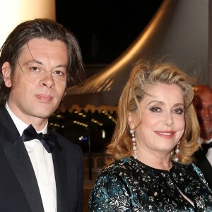 Benjamin Biolay et Catherine Deneuve - 67e Festival de Cannes, le 21 mai 2014.