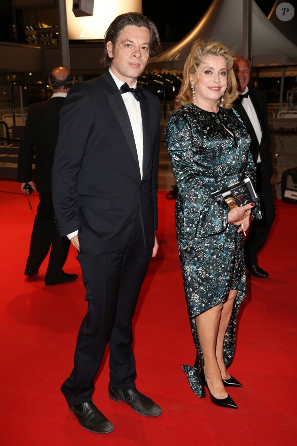 Benjamin Biolay et Catherine Deneuve - 67e Festival de Cannes, le 21 mai 2014.