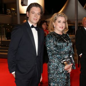 Benjamin Biolay et Catherine Deneuve - 67e Festival de Cannes, le 21 mai 2014.