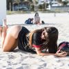 Claudia Romani en séance photo sur la plage de Miami, le 27 janvier 2018.