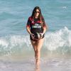 Claudia Romani en séance photo sur la plage de Miami, le 27 janvier 2018.