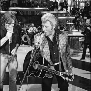 Gérard Depardieu et Johnny Hallyday dans Palmarès 80 à Paris en 1980.