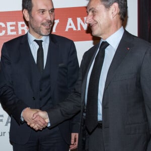 Semi-exclusif - Frédéric Lemos et Nicolas Sarkozy - Vente aux enchères au profit de la campagne "Guérir le cancer de l'enfant" au Pavillon Ledoyen à Paris le 13 février 2018. L'intégralité des dons effectués à l’occasion de cette soirée ira au profit de la campagne "Guérir le cancer de l’enfant au 21ème siècle de la Fondation Gustave Roussy". F. Lemos, le père du petit Noé décédé il y a quatre ans d'un cancer du cerveau, avait fait afficher le visage de son fils sur la Tour Montparnasse pour tout le mois de septembre. Depuis, son combat est devenu cette grande campagne dont N. Sarkozy est le parrain cette année. © Cyril Moreau/Bestimage13/02/2018 - Paris