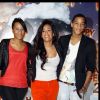 Amel Bent et son frère et sa soeur à l'avant-première du film "Happy Feet 2" au Gaumont Opéra à Paris le 4 décembre 2011.