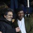 MC Solaar (Claude M'Barali) dans les tribunes du Parc des Princes lors du match de Ligue 1 PSG - OM (3-0), à Paris le 25 février 2018.