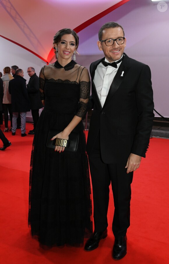 Exclusif - Dany Boon (porte le ruban blanc "Maintenant on agit" ) et sa femme Yael - Arrivées lors de la 43ème cérémonie des Cesar à la salle Pleyel à Paris, le 2 mars 2018. © Stephane Kossman / Bestimage