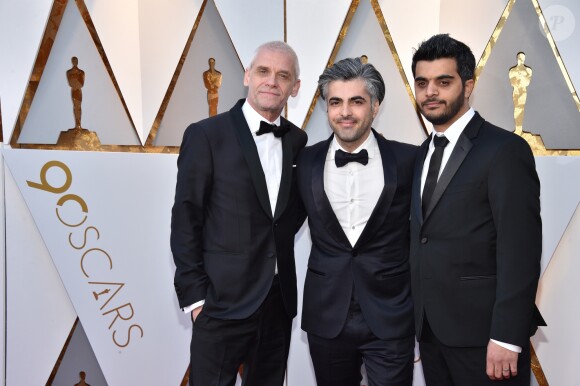 Soren Steen Jespersen, Feras Fayyad et Kareem Abeed sur le tapis rouge des Oscars au Dolby Theatre, Los Angeles, le 4 mars 2018.