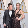 Sam Rockwell et Leslie Bibb sur le tapis rouge des Oscars au Dolby Theatre, Los Angeles, le 4 mars 2018.