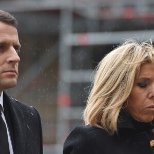 Le président de la République Emmanuel Macron et sa femme la Première Dame Brigitte Macron (Trogneux) - Hommage national du lieutenant-colonel de gendarmerie Arnaud Beltrame aux invalides à Paris le 28 mars 2018. © Eliot Blondet/Pool/Bestimage