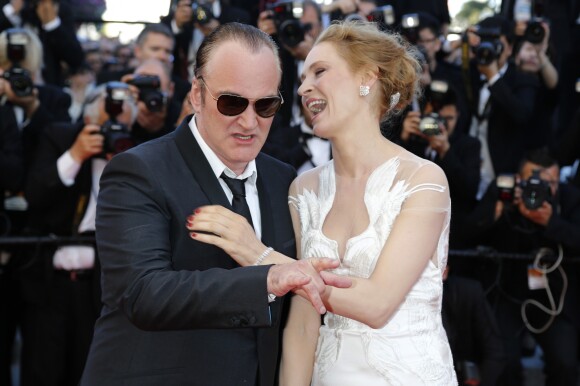 Quentin Tarantino et Uma Thurman - Montée des marches du film "Pour une poignée de dollars" pour la cérémonie de clôture du 67e Festival du film de Cannes – Cannes le 24 mai 2014